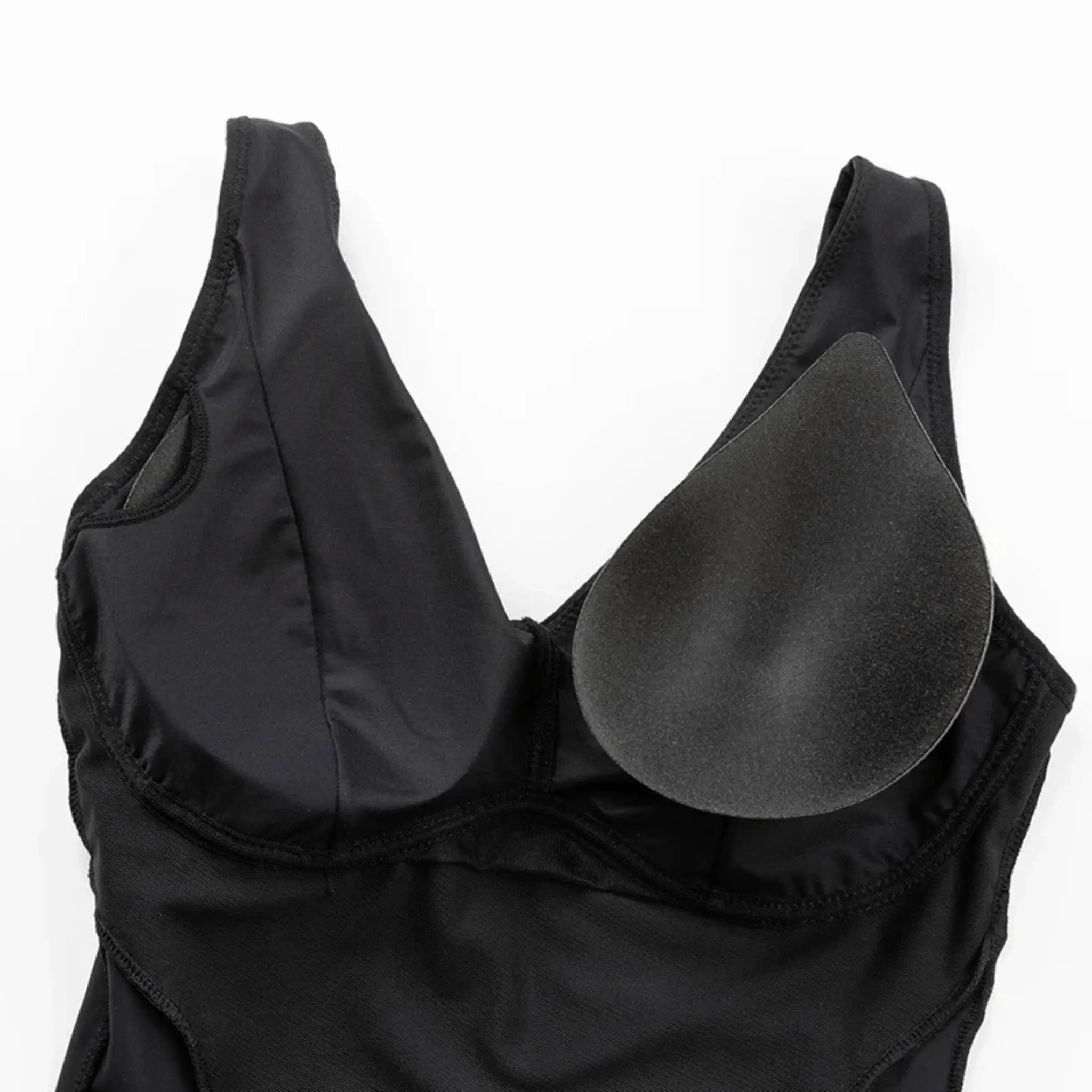 Detalhe interno do bojo removível do body modelador tanga preto