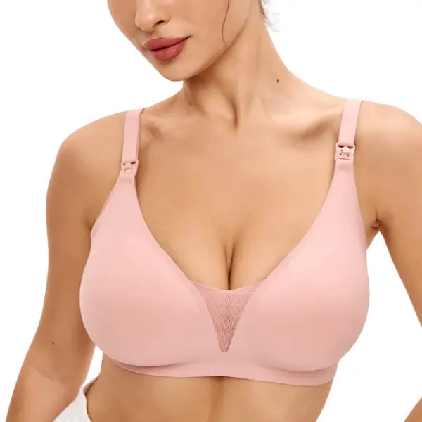 Close do soutien rosé para amamentar sem aro, destacando o tule entre os bojos.