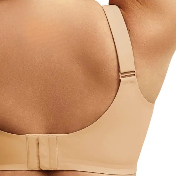 Detalhe do fecho em colchete do soutien redutor bege