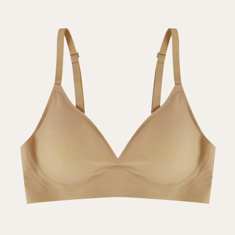 Bralette bege Le Liss sem aro com copas suaves e tecido macio que garante conforto invisível sob a roupa.