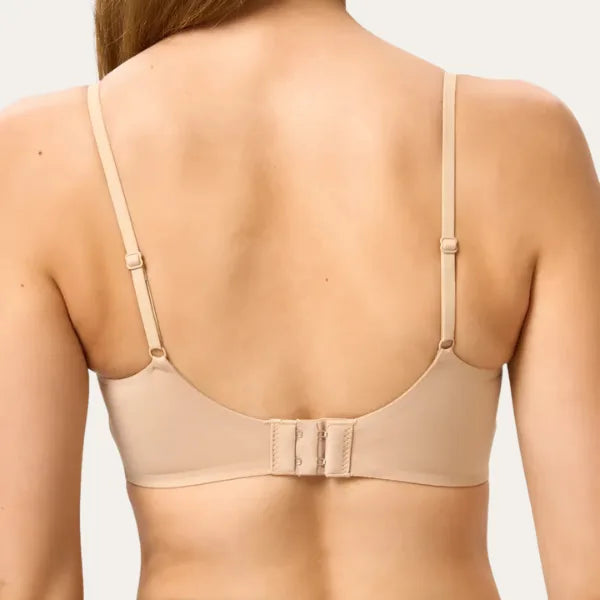 Vista traseira do bralette bege suave Le Liss com fecho ajustável e acabamento suave que não marca a pele.