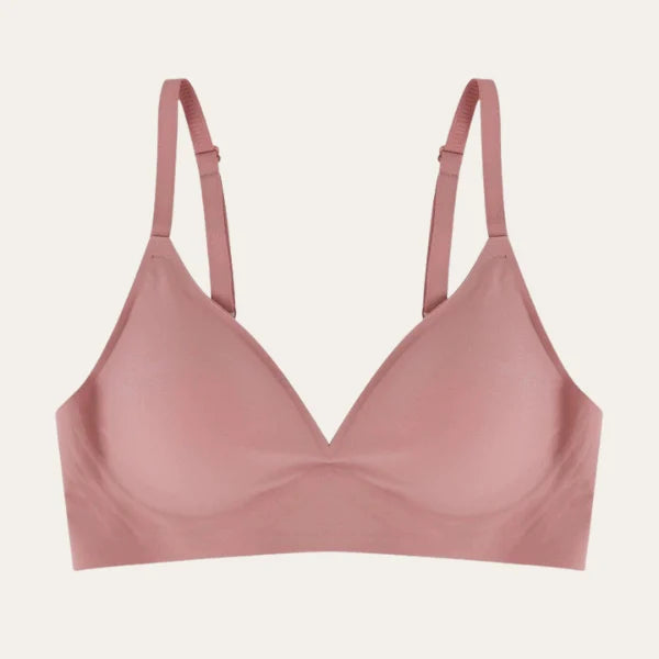 Bralette sem costura na cor rosé com bojo removível e alças finas ajustáveis.