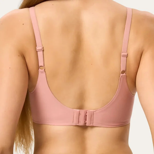 Detalhe das costas do bralette rosé mostrando o fechamento por colchetes duplos e acabamento invisível.