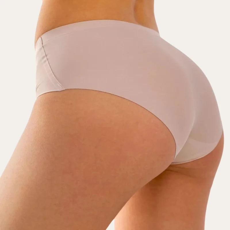 Vista lateral da cueca nude sem costura com cobertura média – Cuecas Essenciais Le Liss