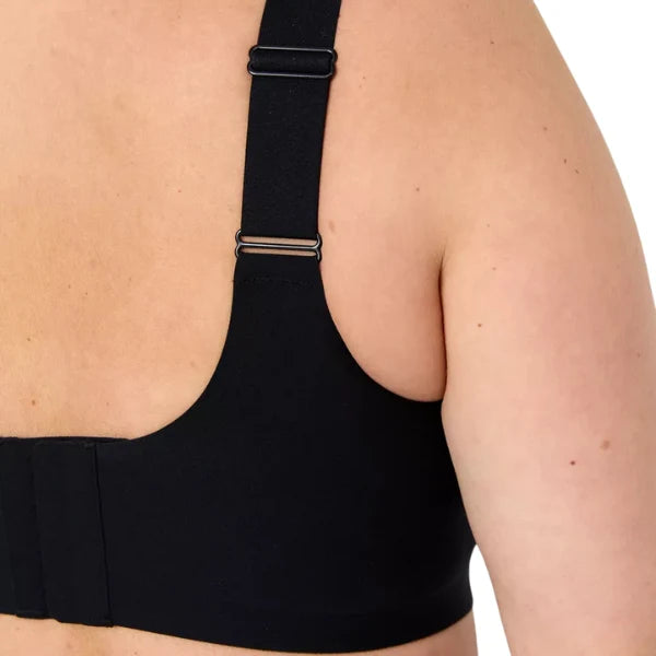 Detalhe das alças ajustáveis e aveludadas do soutien Aura preto.