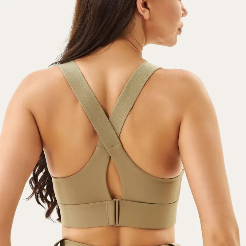 Vista traseira do soutien desportivo Alba bege areia com alças cruzadas – Le Liss