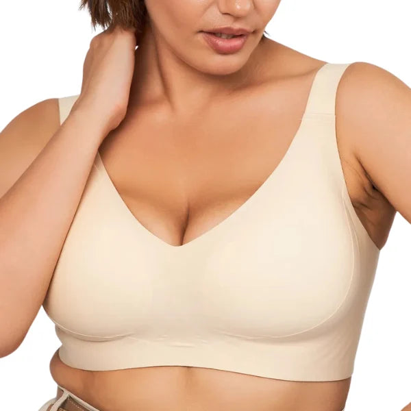 Close-up do soutien Firm de sustentação bege sem aro com alças largas e sem costura.