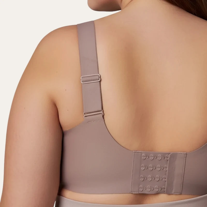 Vista traseira do soutien Firm nude Le Liss, com fecho de colchetes e alças largas e reguláveis para suporte confortável.