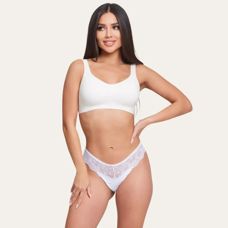 Modelo a usar soutien sem aro branco Grace com laterais largas e design confortável.