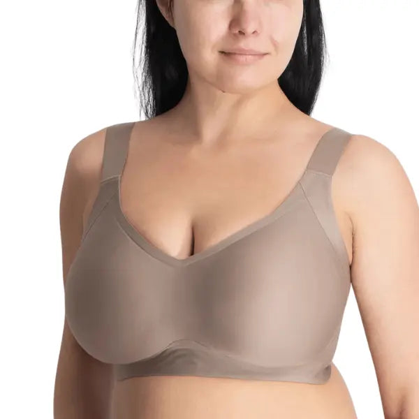 Detalhe do soutien Sculpt nude com decote em V e estrutura de alta sustentação.